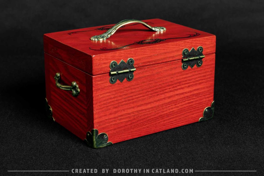 Dorothy in Catland - decorative red wooden box with moth