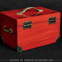 Dorothy in Catland - decorative red wooden box with moth