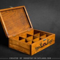 Dorothy in Catland - Tea box with compartments and red moth