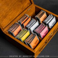 Dorothy in Catland - Tea box with compartments and red moth