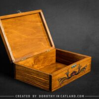 Dorothy-in-Catland-brown-box-with-red-moth