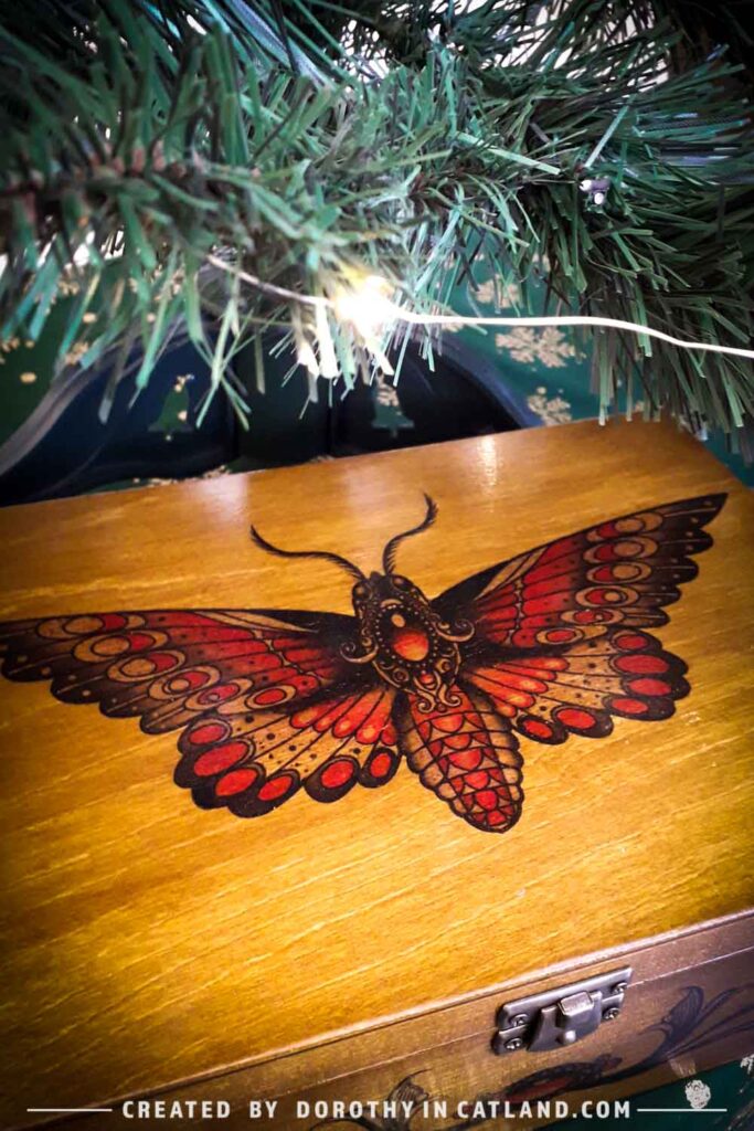 Dorothy in Catland - handicraft shop - wooden box with moth