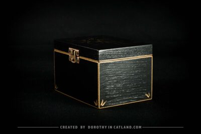 Black wooden jewellery box with a hand-painted golden flower on the lid and a golden bee inside, featuring antique bronze fittings.