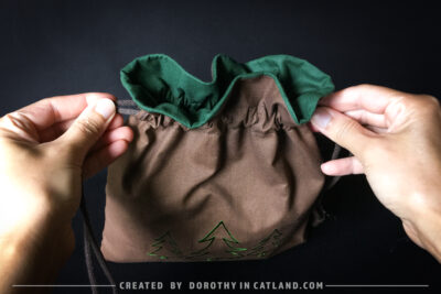 Dorothy in Catland - Brown drawstring bag with Holiday tree - Christmas trees