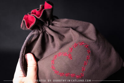 Dorothy in Catland - Brown sachet bag with a heart