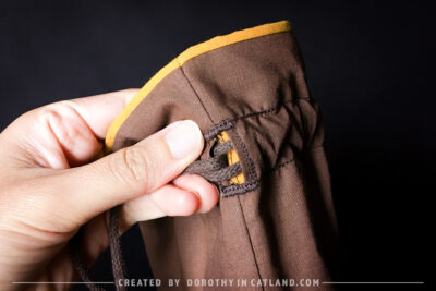 Dorothy in Catland - Brown sachet bag with a yellow butterfly