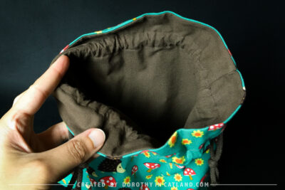 Dorothy in Catland - Drawstring bag with hedgehogs and toadstools