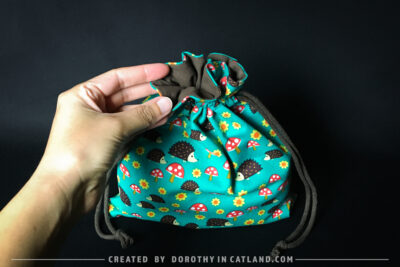 Dorothy in Catland - Drawstring bag with hedgehogs and toadstools