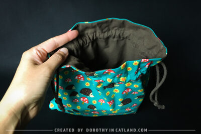 Dorothy in Catland - Drawstring bag with hedgehogs and toadstools