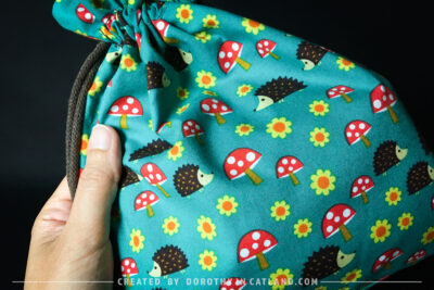Dorothy in Catland - Drawstring bag with hedgehogs and toadstools