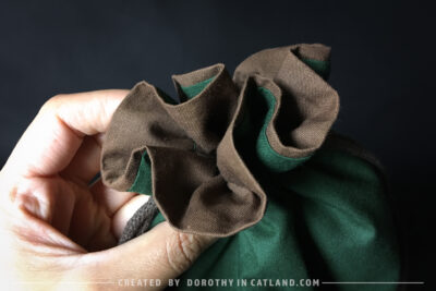 Dorothy in Catland - Green drawstring bag with Holiday tree - Christmas trees