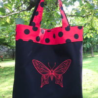 Dorothy in Catland - Black bag with red butterfly - Red bag with large black polka dots