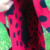 Dorothy in Catland - Red bag with large black polka dots