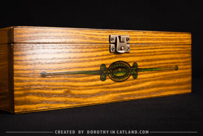 Dorothy in Catland - Tea box with green dragonfly graphic