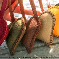 Handmade felt hearts in six autumn colors with hanging loops, rustic fall decor